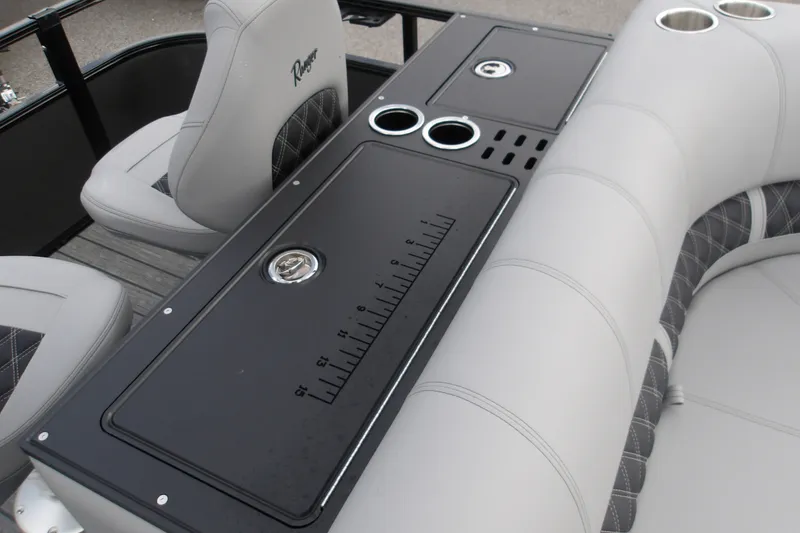 Slide: The Image of Interior of 2026 Ranger 223FC boat with seating and measuring panel. - 20