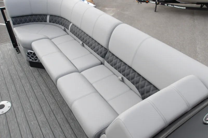Slide: The Image of Luxurious seating on 2026 Ranger 223FC boat with gray upholstery and diamond-pattern accents. - 28