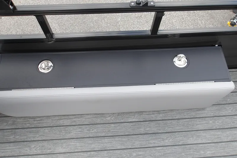 Slide: The Image of 2026 Ranger 223FC boat seat with storage compartment and metallic handles. - 23