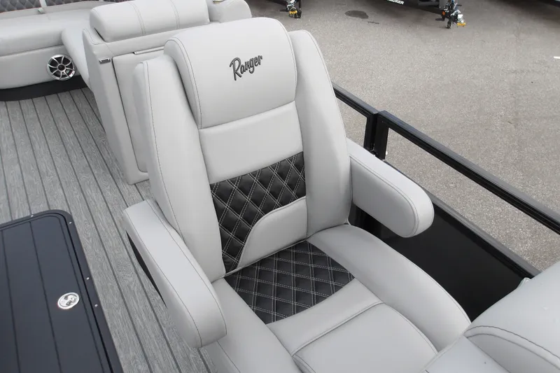 Slide: The Image of Luxurious seating on 2026 Ranger 223FC boat, featuring elegant diamond-stitched upholstery. - 29