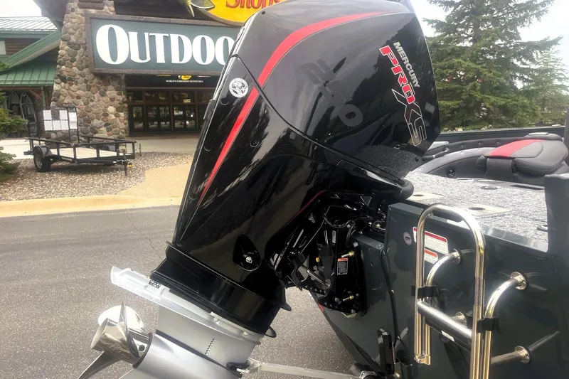 Slide: The Image of 2026 Ranger VX1988 WT boat with Mercury Pro XS engine outside outdoor store. - 7