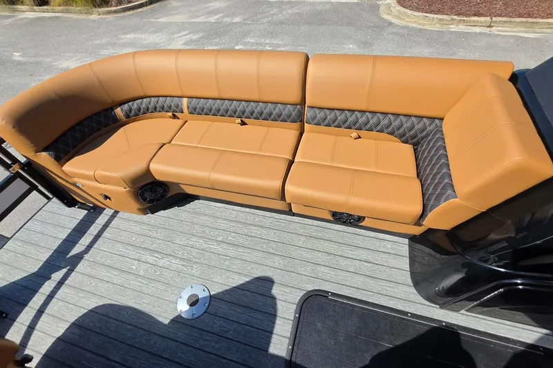 Slide: The Image of Luxurious tan seating on 2026 Ranger 223FC boat, featuring quilted accents and modern design. - 22