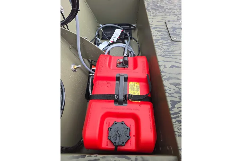 Slide: The Image of Red fuel tank in 2026 Tracker Grizzly 1648 SC boat interior. - 8