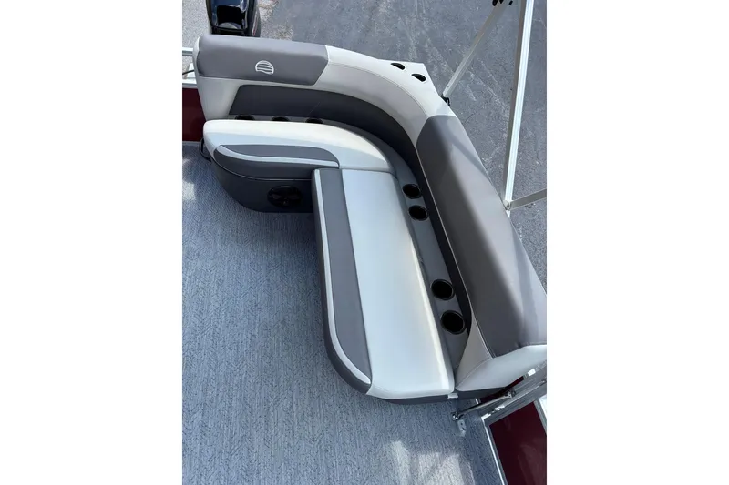 Slide: The Image of 2026 Sun Tracker Bass Buggy 16 XL Select boat seating with cup holders. - 3