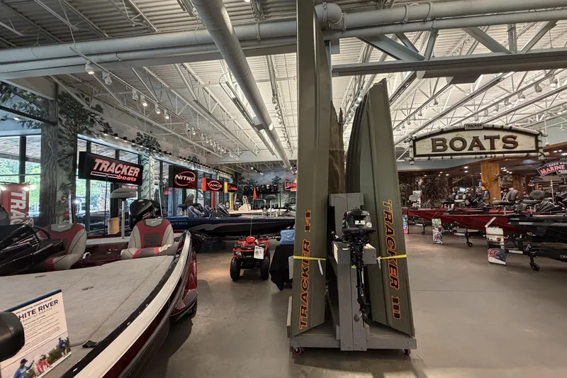 The Image of Boat showroom featuring 2026 Tracker Grizzly 14 Jon models and various marine equipment. - 0