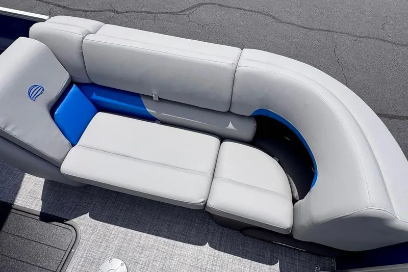 Slide: The Image of 2026 Sun Tracker Party Barge 22 XP3 seating with gray and blue upholstery. - 15