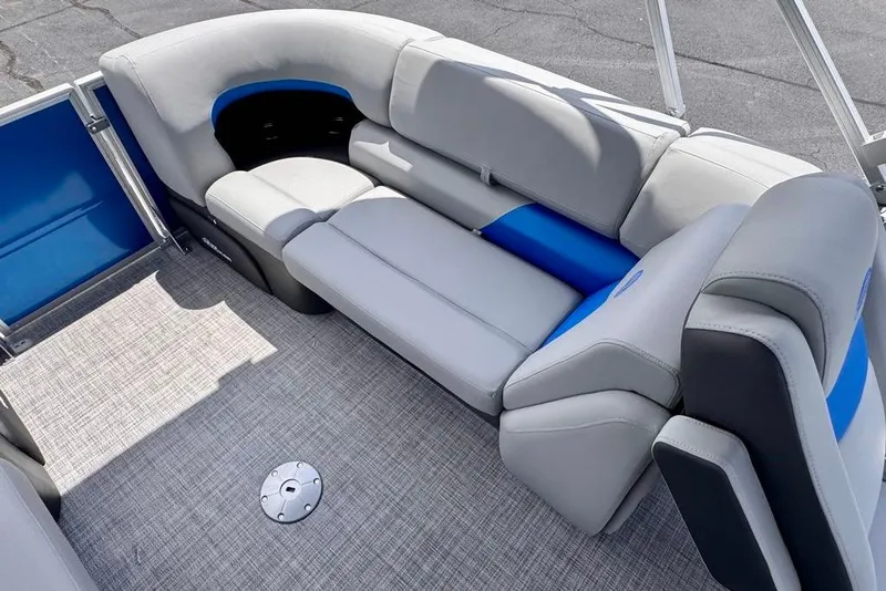 Slide: The Image of 2026 Sun Tracker Party Barge 22 XP3 interior with gray and blue seating. - 13