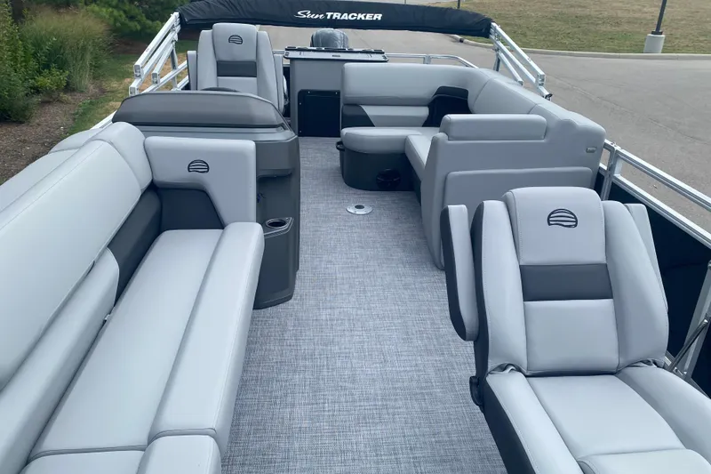 Slide: The Image of 2026 Sun Tracker SportFish 20 DLX pontoon boat with spacious seating and modern design. - 5