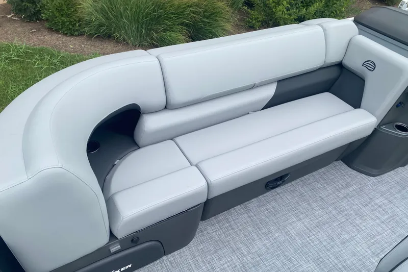 Slide: The Image of 2026 Sun Tracker SportFish 20 DLX boat interior with gray cushioned seating. - 8