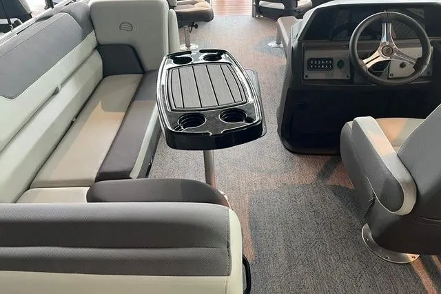 Slide: The Image of Interior of 2026 Sun Tracker Fishin' Barge 22 XP3 with seating and table. - 4