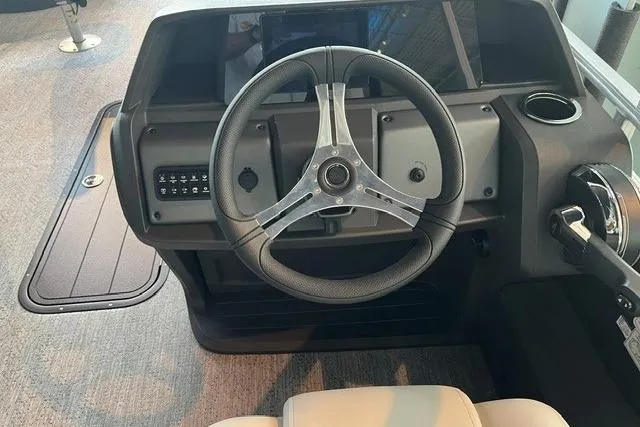 Slide: The Image of Steering console of 2026 Sun Tracker Fishin' Barge 22 XP3 pontoon boat. - 3