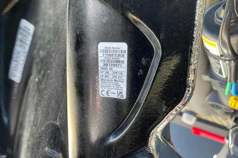 Slide: The Image of Label on a 2026 Tracker Grizzly 2072 CC boat engine, showing model and serial numbers. - 57