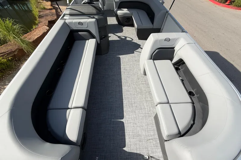 Slide: The Image of 2026 Sun Tracker Party Barge 18 DLX interior with spacious seating and modern design. - 4