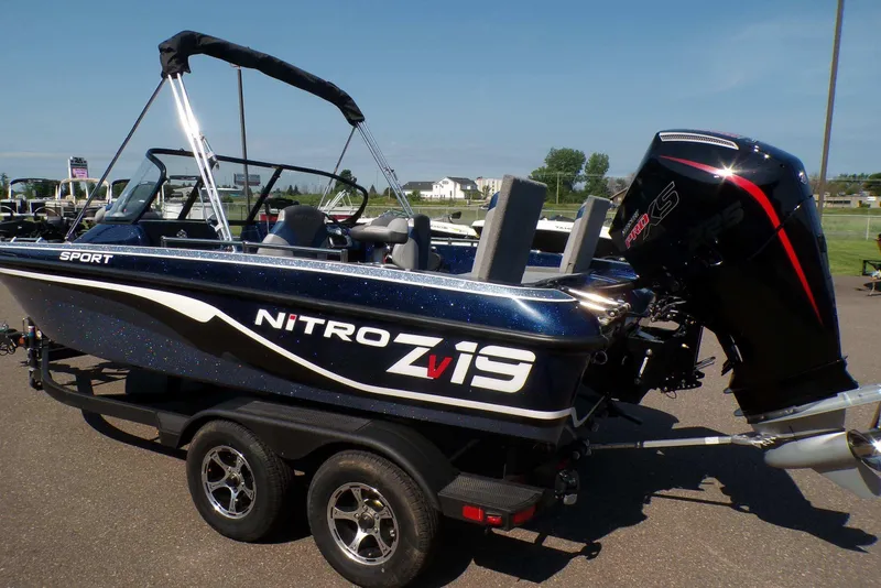 Slide: The Image of 2026 Nitro ZV19 Sport Pro boat on trailer, featuring sleek design and powerful engine. - 1