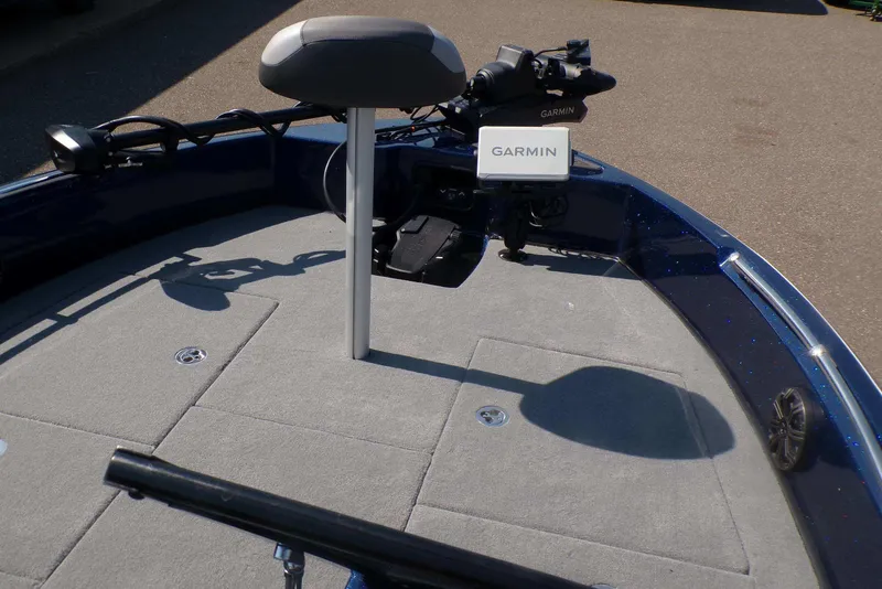 Slide: The Image of 2026 Nitro ZV19 Sport Pro boat with Garmin navigation system and cushioned seating. - 2
