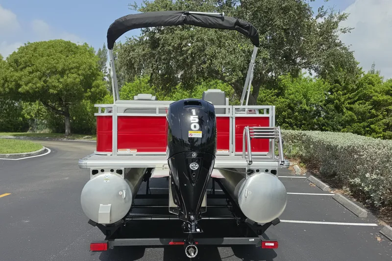 Slide: The Image of 2026 Sun Tracker Party Barge 22 RF DLX pontoon boat with powerful outboard motor. - 14