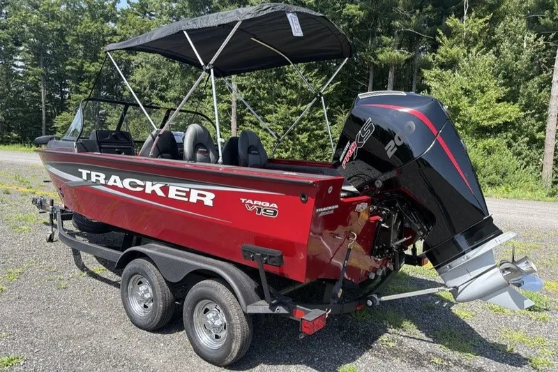 Slide: The Image of 2026 Tracker Targa V-19 WT boat with canopy and powerful outboard motor. - 4