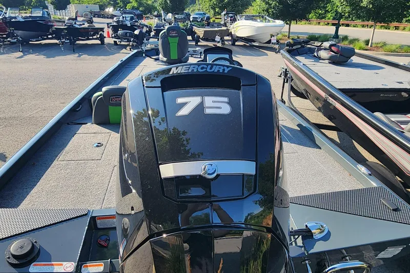 Slide: The Image of 2026 Ranger RT178 boat with Mercury 75 engine in a parking lot. - 5