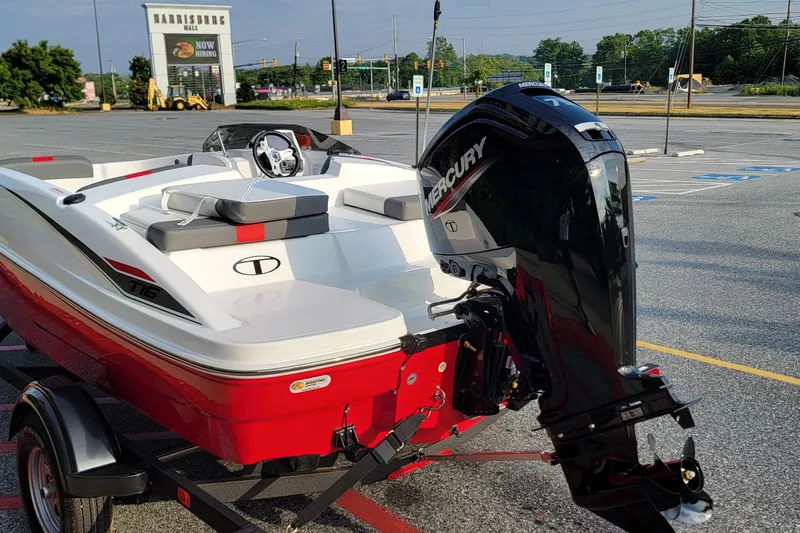 Slide: The Image of 2026 Tahoe T16 boat with Mercury engine in a parking lot near Harrisburg Mall. - 2