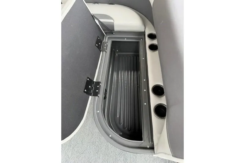 Slide: The Image of Storage compartment in 2026 Sun Tracker Bass Buggy 18 DLX pontoon boat interior. - 87