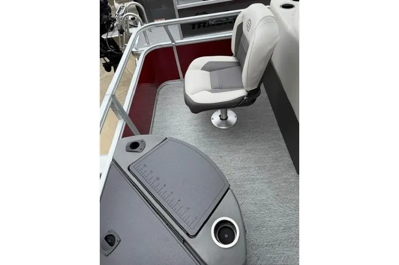 Slide: The Image of 2026 Sun Tracker Bass Buggy 18 DLX interior with swivel seat and fishing station. - 86