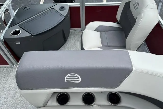 Slide: The Image of 2026 Sun Tracker Bass Buggy 18 DLX interior with seating and console details. - 13
