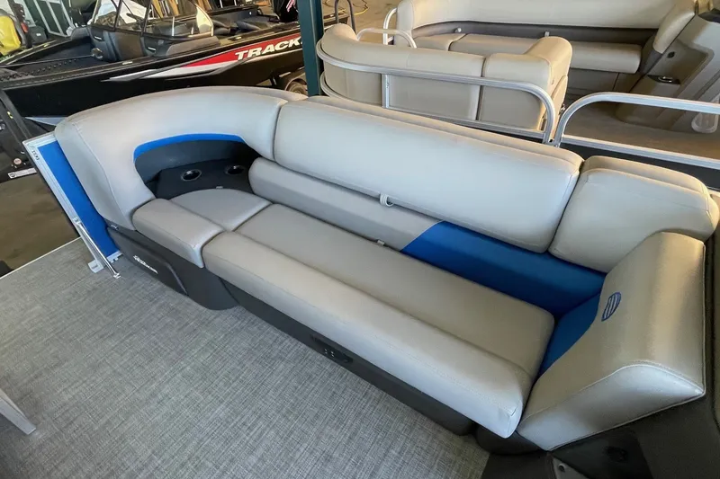 Slide: The Image of 2026 Sun Tracker Party Barge 20 DLX interior with comfortable seating and modern design. - 3