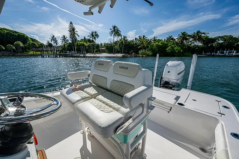 Slide: The Image of 2020 Caymas 28 HB boat interior with seating and water view. - 26