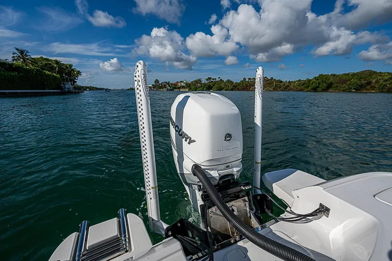 Slide: The Image of 2020 Caymas 28 HB boat with Mercury engine on a scenic waterway. - 21