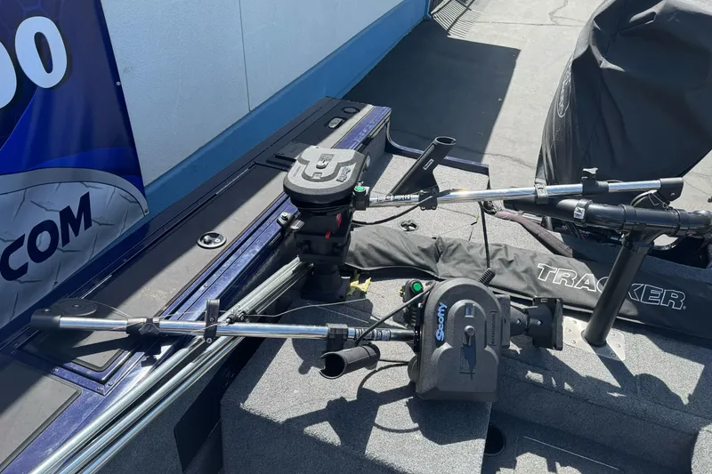 Slide: The Image of 2024 Tracker Targa V-18 Combo boat deck with fishing equipment and accessories. - 13