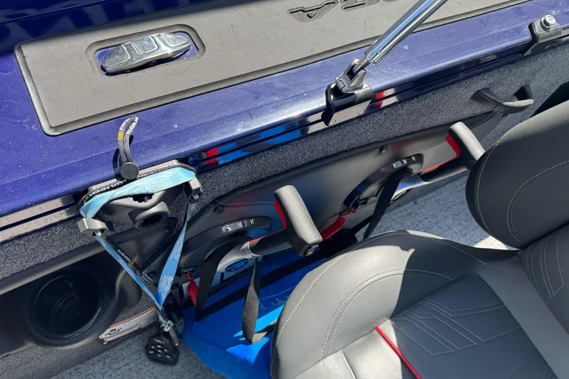Slide: The Image of 2024 Tracker Targa V-18 Combo interior with seating and storage features. - 20
