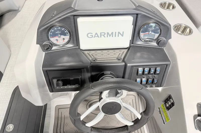 Slide: The Image of Steering console of 2026 Manitou Encore SL SHP575 with Garmin display and controls. - 21