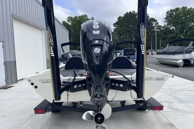 Slide: The Image of 2021 Tracker Pro Team 195 TXW Tournament Edition boat, rear view with motor and Power-Pole anchors. - 3