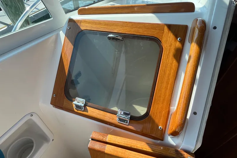 Slide: The Image of Wooden hatch detail on 2004 Hunt Yachts Surfhunter 29, showcasing craftsmanship and design. - 18