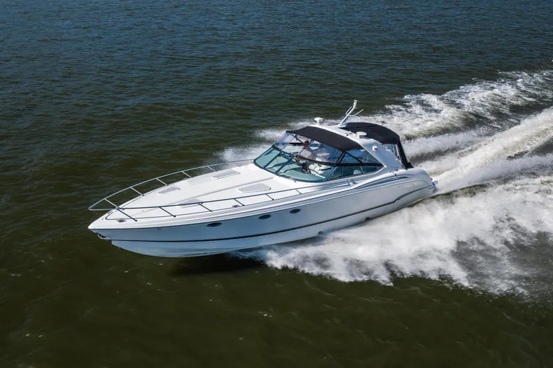 Slide: The Image of 2007 Formula 400 Super Sport boat cruising on open water, creating a dynamic wake. - 3