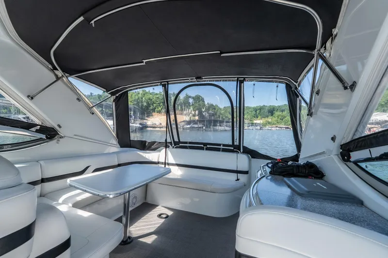 Slide: The Image of Interior of a 2007 Formula 400 Super Sport yacht with seating and table. - 59