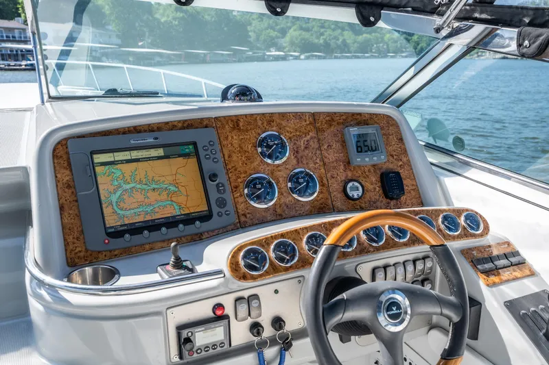 Slide: The Image of Dashboard of a 2007 Formula 400 Super Sport boat with navigation system and gauges. - 22