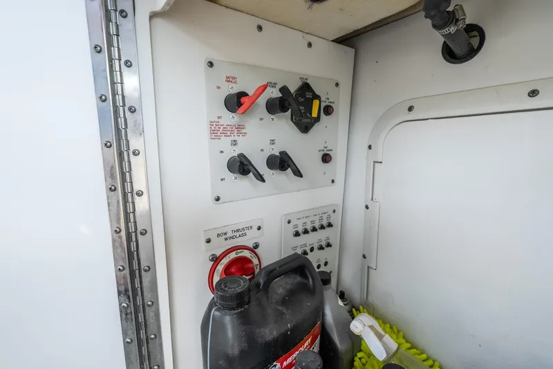 Slide: The Image of Control panel of a 2007 Formula 400 Super Sport boat with switches and a fuel container. - 38