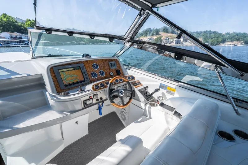 Slide: The Image of 2007 Formula 400 Super Sport boat cockpit with navigation system and luxurious seating. - 20