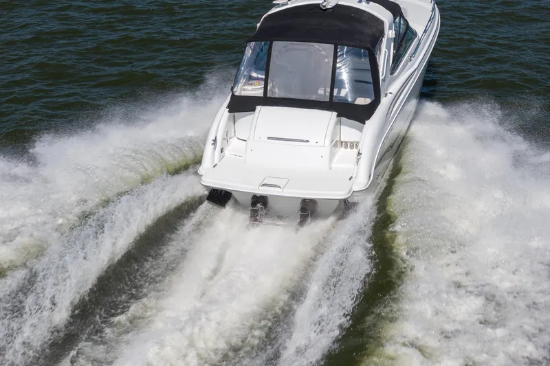 Slide: The Image of 2007 Formula 400 Super Sport boat cruising swiftly on open water. - 9