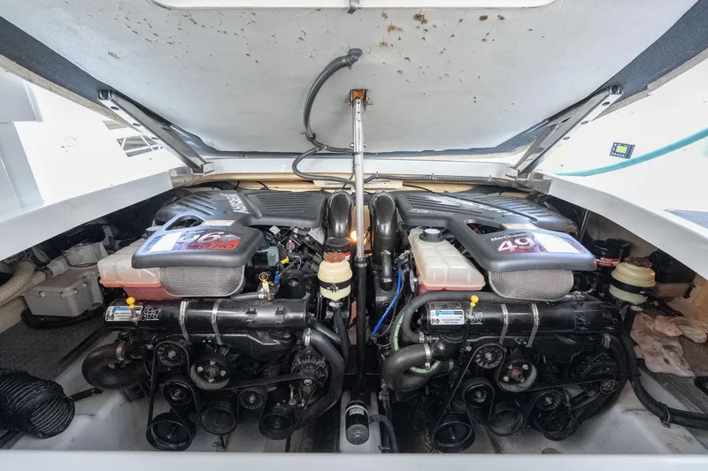 Slide: The Image of Engine compartment of a 2007 Formula 400 Super Sport boat, featuring dual MerCruiser engines. - 50