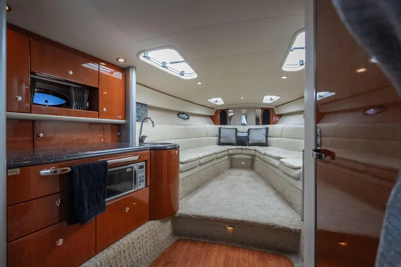Slide: The Image of Luxurious interior of a 2007 Formula 400 Super Sport yacht with plush seating and modern amenities. - 44