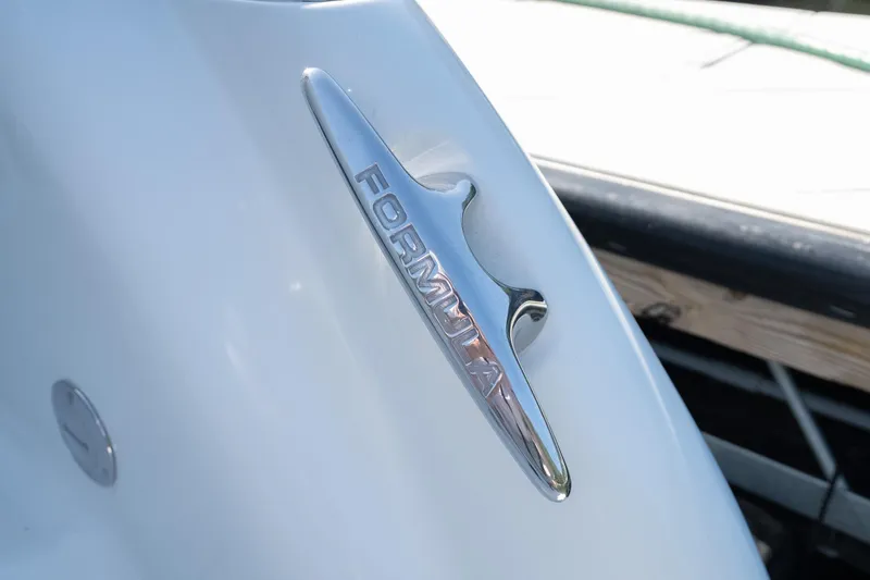 Slide: The Image of Close-up of 2007 Formula 400 Super Sport boat emblem on white surface. - 52