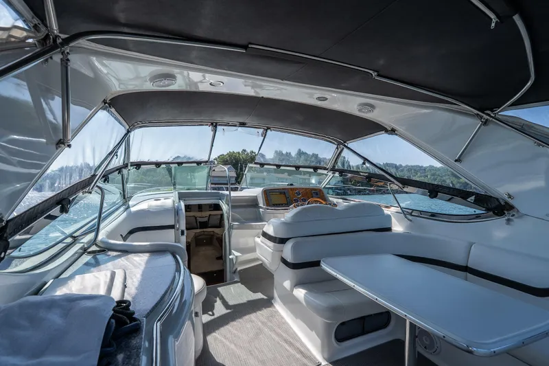 Slide: The Image of Interior of a 2007 Formula 400 Super Sport boat with seating and helm. - 32
