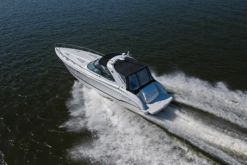 Slide: The Image of 2007 Formula 400 Super Sport boat cruising on open water, aerial view. - 6