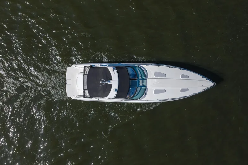 Slide: The Image of Overhead view of a 2007 Formula 400 Super Sport boat cruising on water. - 10