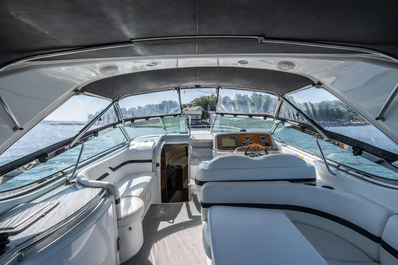 Slide: The Image of Interior view of a 2007 Formula 400 Super Sport boat with luxurious seating and dashboard. - 30