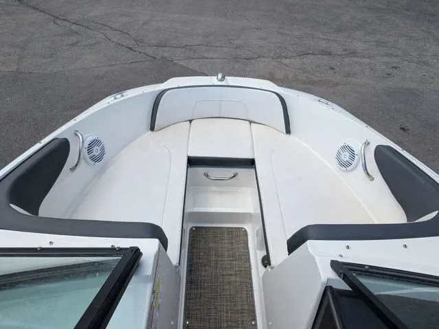 Slide: The Image of The image shows the bow of a Sea Ray SPX 190 boat with seating and speakers. - 5
