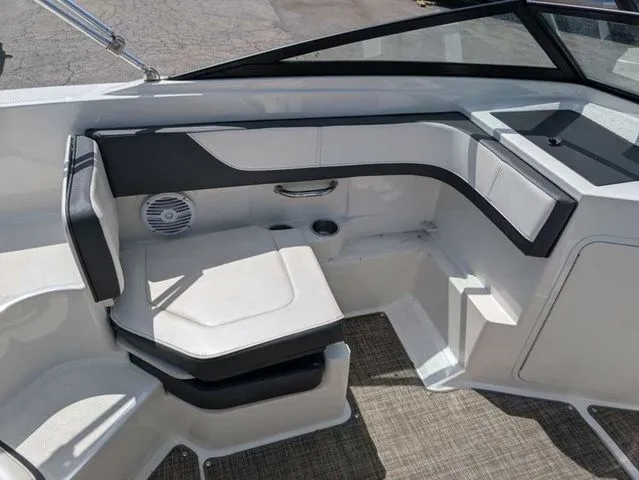 Slide: The Image of Interior of a 2017 Sea Ray SPX 190 boat with white and black seating. - 10