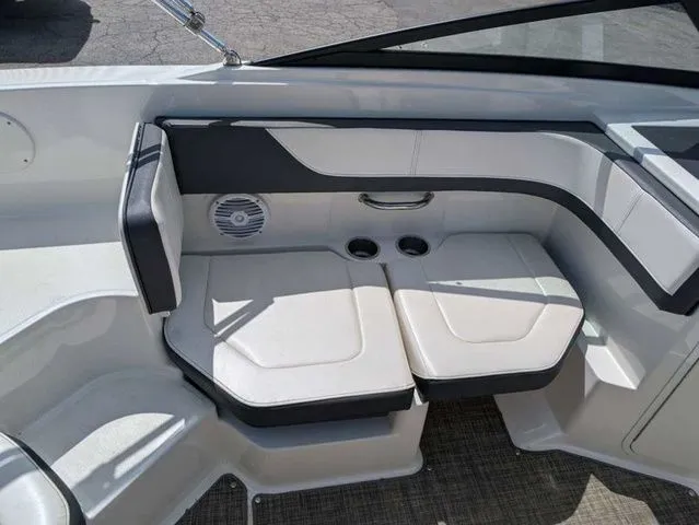 Slide: The Image of Interior of the 2017 Sea Ray SPX 190 with white and gray seating. - 8